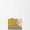 Kompaktes Puzzle-Portemonnaie aus klassischem Kalbsleder Kompaktes Puzzle-Portemonnaie aus klassischem Kalbsleder