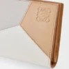 Kompaktes Puzzle-Portemonnaie aus klassischem Kalbsleder Kompaktes Puzzle-Portemonnaie aus klassischem Kalbsleder