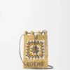 Kordelzugtasche aus klassischem Kalbsleder und Raffia Kordelzugtasche aus klassischem Kalbsleder und Raffia