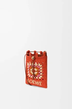 Kordelzugtasche aus klassischem Kalbsleder und Raffia