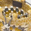 Kordelzugtasche aus klassischem Kalbsleder und Raffia Kordelzugtasche aus klassischem Kalbsleder und Raffia