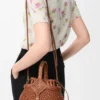 Mini-Korb-Tasche „Diamond Round“ aus Kalbsleder Mini-Korb-Tasche „Diamond Round“ aus Kalbsleder