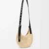 Mini-Punch-Hole-Hobo aus Raffia und Kalbsleder Mini-Punch-Hole-Hobo aus Raffia und Kalbsleder