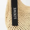 Mini-Punch-Hole-Hobo aus Raffia und Kalbsleder Mini-Punch-Hole-Hobo aus Raffia und Kalbsleder