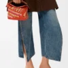 Mini Puzzle Edge Tasche aus Raffia und Kalbsleder Mini Puzzle Edge Tasche aus Raffia und Kalbsleder