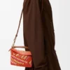 Mini Puzzle Edge Tasche aus Raffia und Kalbsleder Mini Puzzle Edge Tasche aus Raffia und Kalbsleder