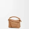Mini Puzzle Edge Tasche aus weichem, genarbtem Kalbsleder Mini Puzzle Edge Tasche aus weichem, genarbtem Kalbsleder