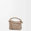 Mini Puzzle Edge Tasche aus weichem, genarbtem Kalbsleder Mini Puzzle Edge Tasche aus weichem, genarbtem Kalbsleder