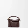 Mini Puzzle Edge Tasche aus weichem, genarbtem Kalbsleder Mini Puzzle Edge Tasche aus weichem, genarbtem Kalbsleder