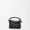 Mini Puzzle Edge Tasche aus weichem, genarbtem Kalbsleder Mini Puzzle Edge Tasche aus weichem, genarbtem Kalbsleder