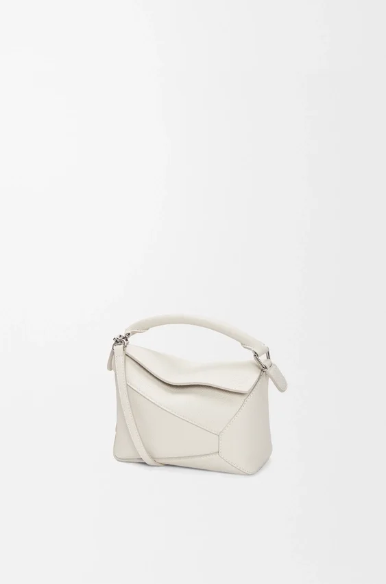 Mini Puzzle Edge Tasche aus weichem, genarbtem Kalbsleder Mini Puzzle Edge Tasche aus weichem, genarbtem Kalbsleder