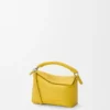 Mini Puzzle Edge Tasche aus weichem, genarbtem Kalbsleder Mini Puzzle Edge Tasche aus weichem, genarbtem Kalbsleder