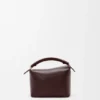 Mini Puzzle Edge Tasche aus weichem, genarbtem Kalbsleder Mini Puzzle Edge Tasche aus weichem, genarbtem Kalbsleder