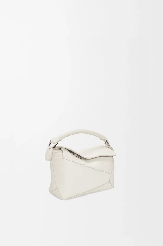 Mini Puzzle Edge Tasche aus weichem, genarbtem Kalbsleder Mini Puzzle Edge Tasche aus weichem, genarbtem Kalbsleder