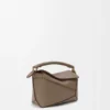 Mini Puzzle Edge Tasche aus weichem, genarbtem Kalbsleder Mini Puzzle Edge Tasche aus weichem, genarbtem Kalbsleder