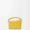 Mini Puzzle Edge Tasche aus weichem, genarbtem Kalbsleder Mini Puzzle Edge Tasche aus weichem, genarbtem Kalbsleder