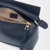 Mini Puzzle Edge Tasche aus weichem, genarbtem Kalbsleder Mini Puzzle Edge Tasche aus weichem, genarbtem Kalbsleder