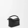 Mini Puzzle Edge Tasche aus weichem, genarbtem Kalbsleder Mini Puzzle Edge Tasche aus weichem, genarbtem Kalbsleder