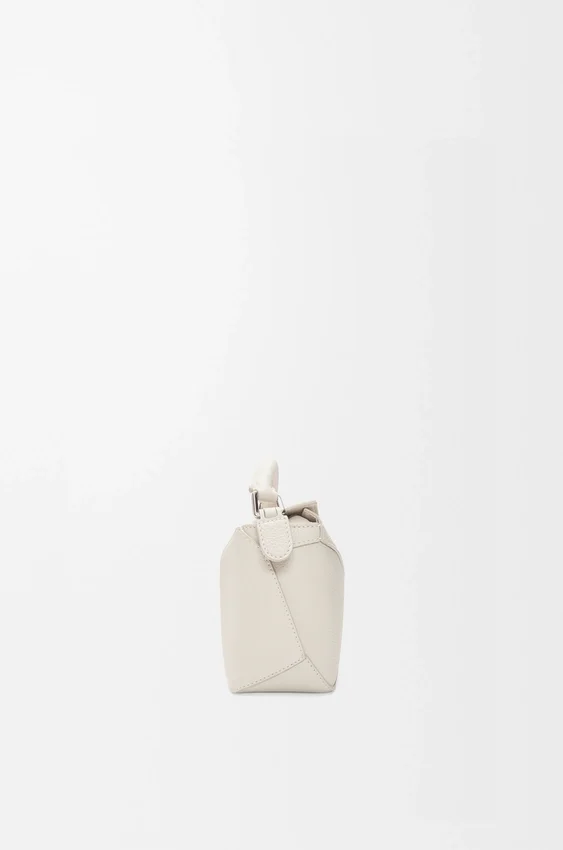 Mini Puzzle Edge Tasche aus weichem, genarbtem Kalbsleder Mini Puzzle Edge Tasche aus weichem, genarbtem Kalbsleder