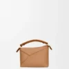 Mini Puzzle Edge Tasche aus weichem, genarbtem Kalbsleder Mini Puzzle Edge Tasche aus weichem, genarbtem Kalbsleder