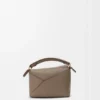 Mini Puzzle Edge Tasche aus weichem, genarbtem Kalbsleder Mini Puzzle Edge Tasche aus weichem, genarbtem Kalbsleder