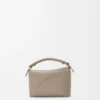 Mini Puzzle Edge Tasche aus weichem, genarbtem Kalbsleder Mini Puzzle Edge Tasche aus weichem, genarbtem Kalbsleder