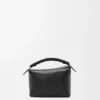 Mini Puzzle Edge Tasche aus weichem, genarbtem Kalbsleder Mini Puzzle Edge Tasche aus weichem, genarbtem Kalbsleder