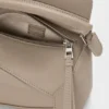 Mini Puzzle Edge Tasche aus weichem, genarbtem Kalbsleder Mini Puzzle Edge Tasche aus weichem, genarbtem Kalbsleder