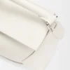 Mini Puzzle Edge Tasche aus weichem, genarbtem Kalbsleder Mini Puzzle Edge Tasche aus weichem, genarbtem Kalbsleder