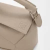 Mini Puzzle Edge Tasche aus weichem, genarbtem Kalbsleder Mini Puzzle Edge Tasche aus weichem, genarbtem Kalbsleder