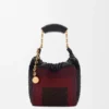 Mini-Squeeze-Tasche aus perlenverziertem Leder Mini-Squeeze-Tasche aus perlenverziertem Leder