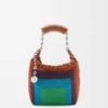Mini-Squeeze-Tasche aus perlenverziertem Leder Mini-Squeeze-Tasche aus perlenverziertem Leder