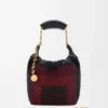 Mini-Squeeze-Tasche aus perlenverziertem Leder Mini-Squeeze-Tasche aus perlenverziertem Leder