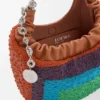 Mini-Squeeze-Tasche aus perlenverziertem Leder Mini-Squeeze-Tasche aus perlenverziertem Leder
