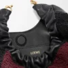 Mini-Squeeze-Tasche aus perlenverziertem Leder Mini-Squeeze-Tasche aus perlenverziertem Leder