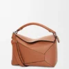 Mittlere „Puzzle Edge“-Tasche aus klassischem Kalbsleder Mittlere „Puzzle Edge“-Tasche aus klassischem Kalbsleder