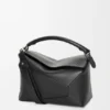 Mittlere „Puzzle Edge“-Tasche aus klassischem Kalbsleder Mittlere „Puzzle Edge“-Tasche aus klassischem Kalbsleder