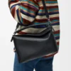 Mittlere „Puzzle Edge“-Tasche aus klassischem Kalbsleder Mittlere „Puzzle Edge“-Tasche aus klassischem Kalbsleder