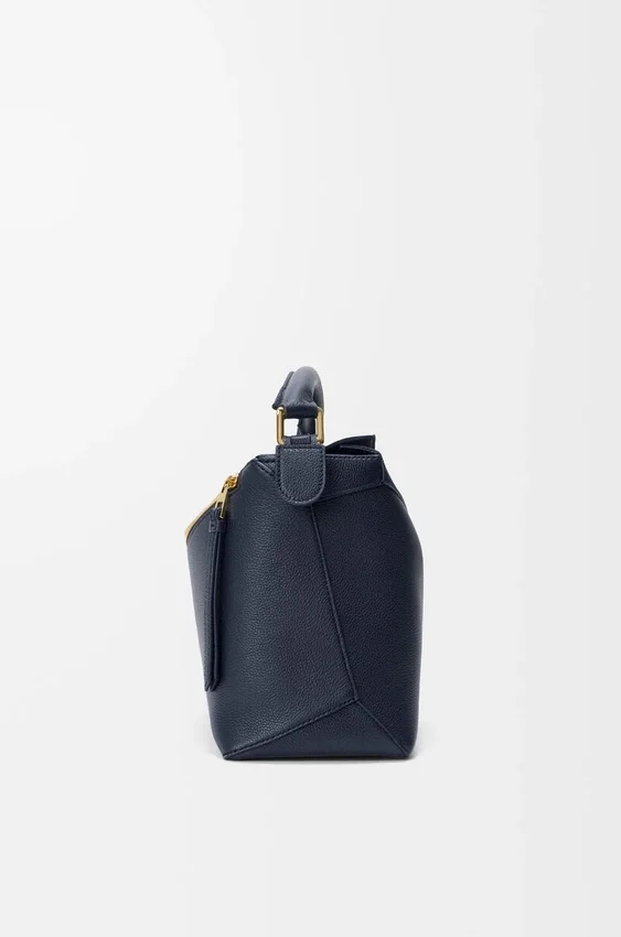 Mittlere „Puzzle Edge“-Tasche aus weichem, genarbtem Kalbsleder Mittlere „Puzzle Edge“-Tasche aus weichem, genarbtem Kalbsleder