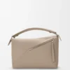 Mittlere „Puzzle Edge“-Tasche aus weichem, genarbtem Kalbsleder Mittlere „Puzzle Edge“-Tasche aus weichem, genarbtem Kalbsleder