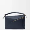 Mittlere „Puzzle Edge“-Tasche aus weichem, genarbtem Kalbsleder Mittlere „Puzzle Edge“-Tasche aus weichem, genarbtem Kalbsleder