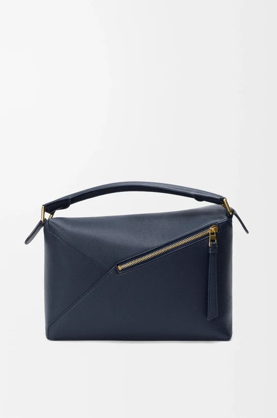 Mittlere „Puzzle Edge“-Tasche aus weichem, genarbtem Kalbsleder Mittlere „Puzzle Edge“-Tasche aus weichem, genarbtem Kalbsleder