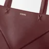 Mittlere „Puzzle Fold“-Tasche aus glänzendem Kalbsleder Mittlere „Puzzle Fold“-Tasche aus glänzendem Kalbsleder