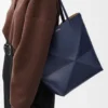 Mittlere „Puzzle Fold“-Tasche aus glänzendem Kalbsleder Mittlere „Puzzle Fold“-Tasche aus glänzendem Kalbsleder