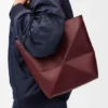Mittlere „Puzzle Fold“-Tasche aus glänzendem Kalbsleder Mittlere „Puzzle Fold“-Tasche aus glänzendem Kalbsleder