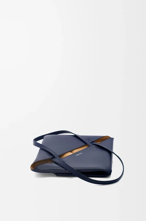 Mittlere „Puzzle Fold“-Tasche aus glänzendem Kalbsleder Mittlere „Puzzle Fold“-Tasche aus glänzendem Kalbsleder