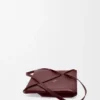 Mittlere „Puzzle Fold“-Tasche aus glänzendem Kalbsleder Mittlere „Puzzle Fold“-Tasche aus glänzendem Kalbsleder
