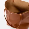 Mittlere „Puzzle Fold“-Tasche aus glänzendem Kalbsleder Mittlere „Puzzle Fold“-Tasche aus glänzendem Kalbsleder