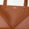 Mittlere „Puzzle Fold“-Tasche aus glänzendem Kalbsleder Mittlere „Puzzle Fold“-Tasche aus glänzendem Kalbsleder