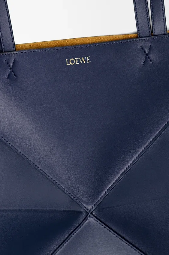 Mittlere „Puzzle Fold“-Tasche aus glänzendem Kalbsleder Mittlere „Puzzle Fold“-Tasche aus glänzendem Kalbsleder